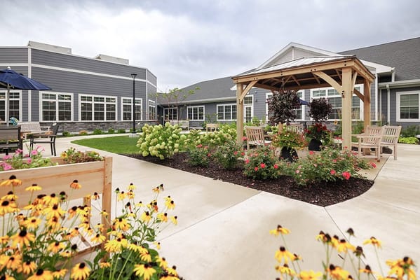 Outdoor garden with seating and flowers