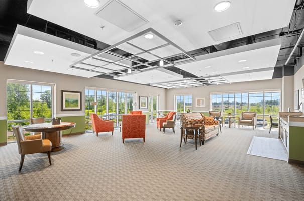 Bright common area with comfortable seating and natural light