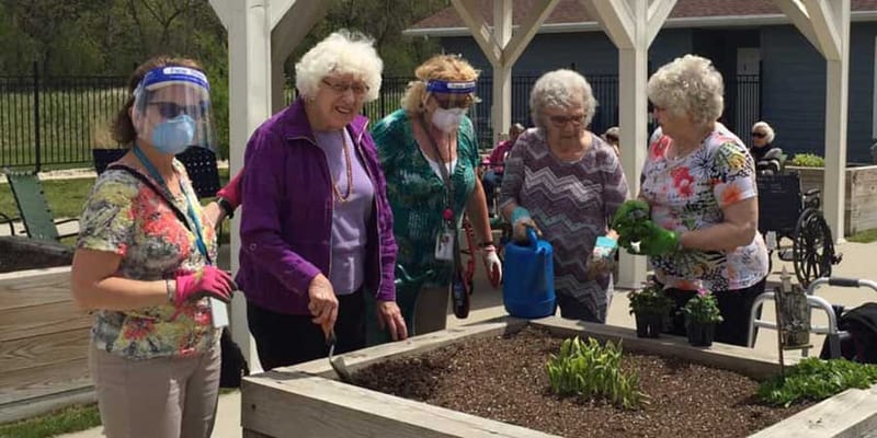 Residents gardening in an outdoor space