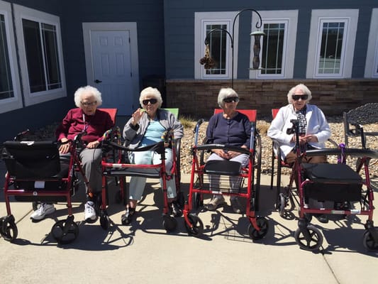 Residents enjoying the outdoors in wheelchairs