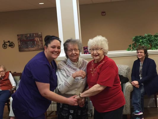 Residents participating in an activity with staff