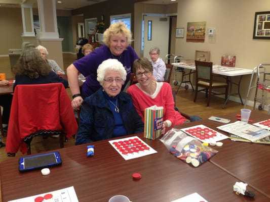Residents enjoying a fun game activity in a common area