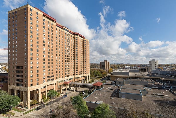Exterior view of Charter House building with cloudy sky