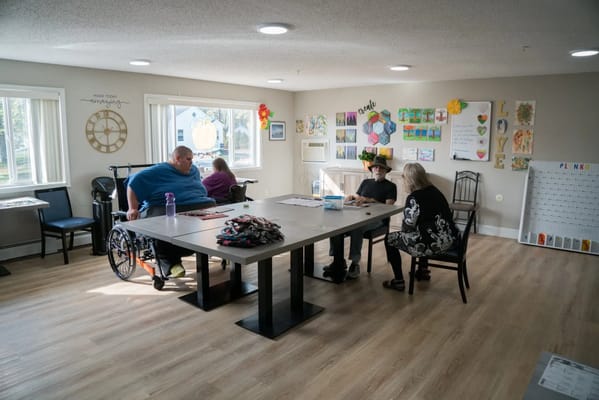 Residents engaged in a common area activity