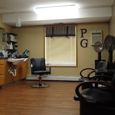 Hair salon with styling chairs and products
