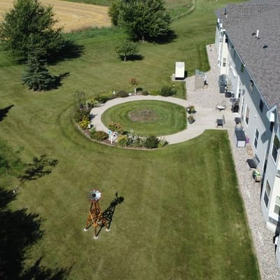 Aerial view of landscaped outdoor space with garden