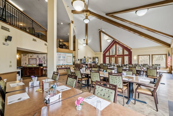 Bright dining room with neatly set tables