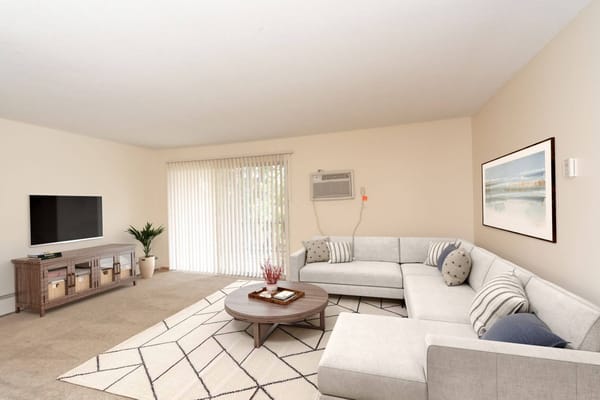 Bright and airy common area with modern furnishings