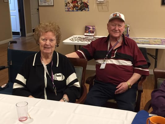 Two residents enjoying time in the common area