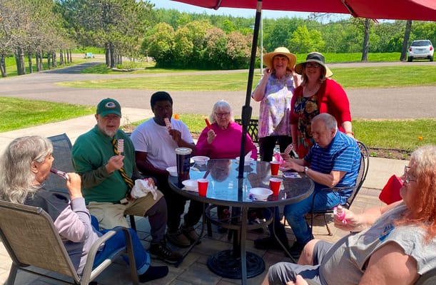 Residents enjoying ice cream on the patio