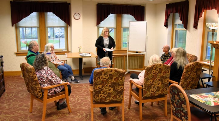 Residents engaged in a group activity in a common area