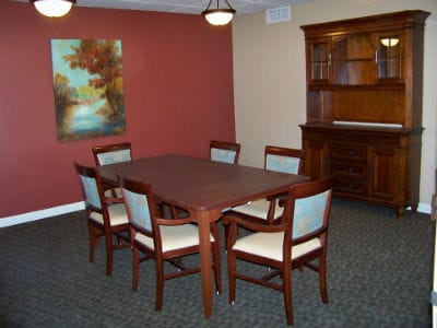 Dining area with wooden table and chairs