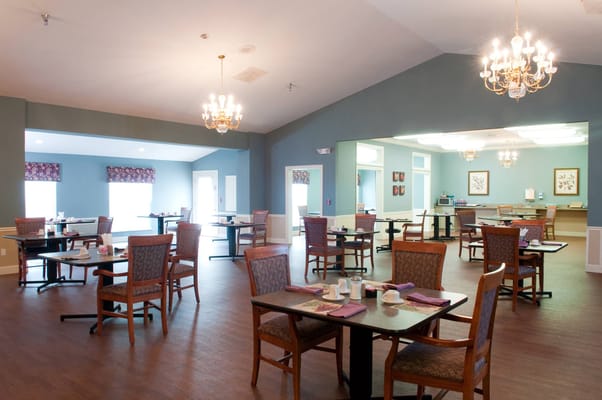 Dining room with tables and chairs in a pleasant setting