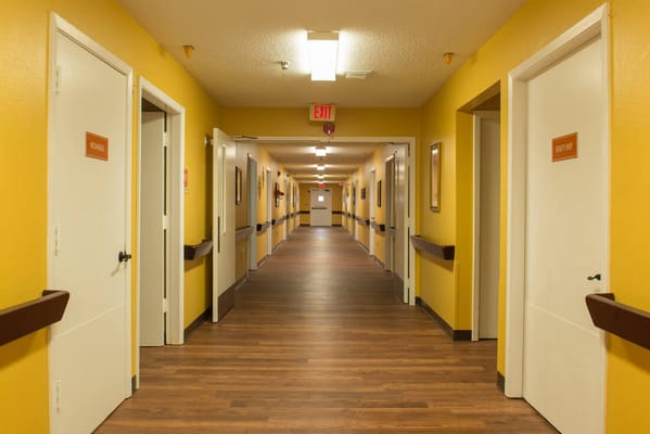 Brightly lit hallway in a senior living facility
