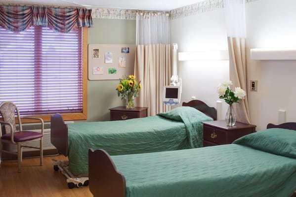 A cozy shared room in a senior living facility