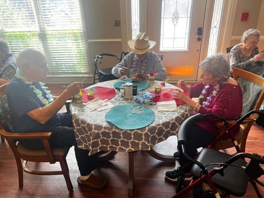 Residents enjoying a meal together in a common area