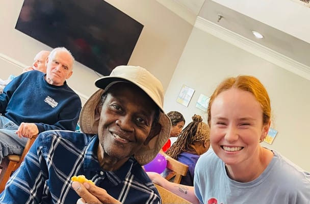 Residents enjoying a meal together in a common area