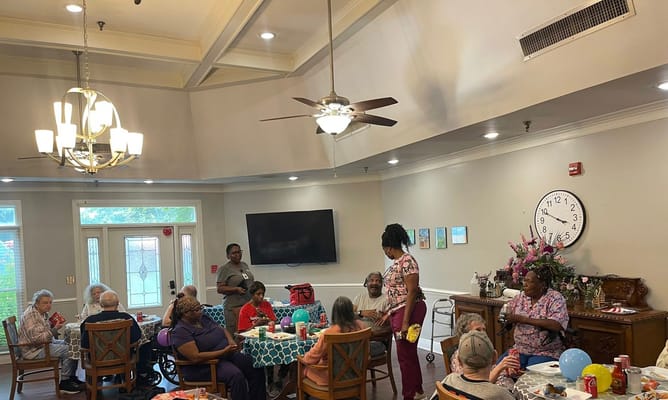 Residents enjoying a party in a common area