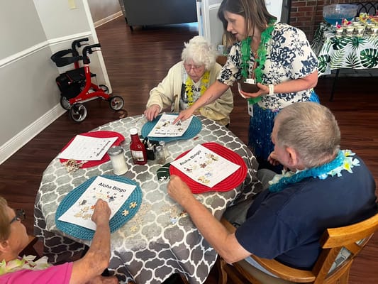 Residents playing bingo in a common area