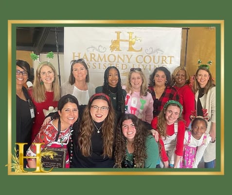 Staff and residents celebrating at an event