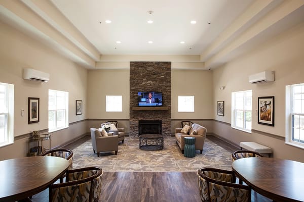Common area with seating and a television