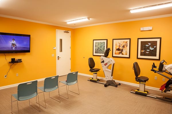 Interior exercise room with fitness equipment