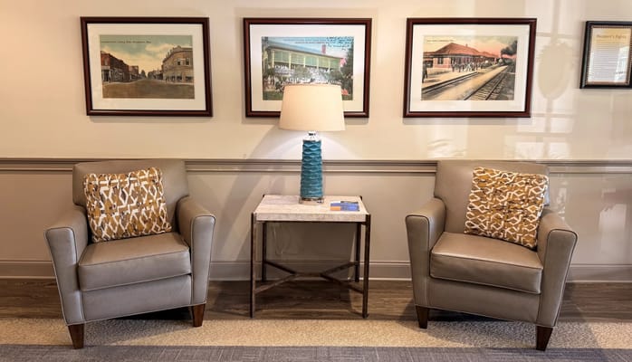 Stylish seating area with artwork in a common room