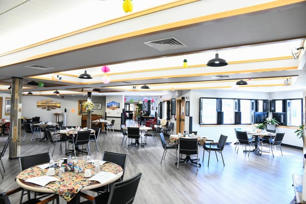 Bright dining area with decorated tables and chairs
