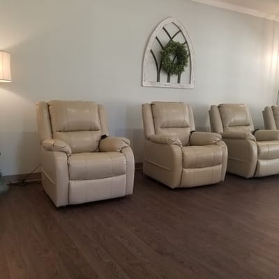 Comfortable recliners in a serene interior space