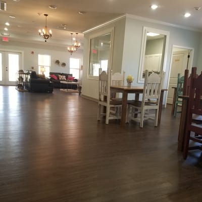 Interior view of the common area with seating and tables