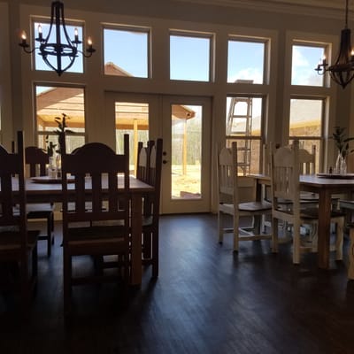 Interior view of a dining room with outdoor access