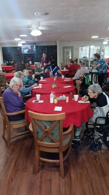 Residents enjoying a social activity in the common area