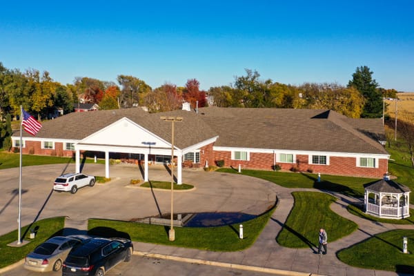 Aerial view of a senior living facility with outdoor space