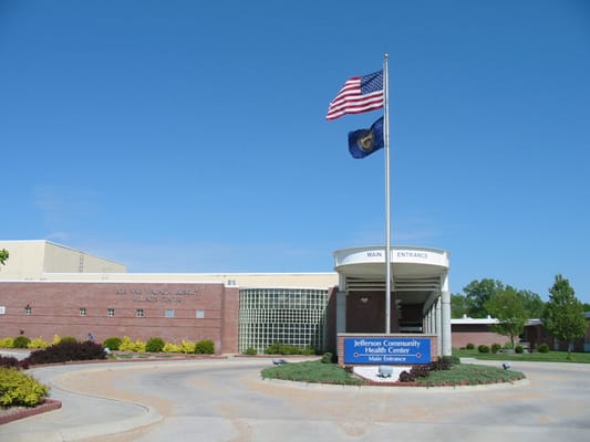Exterior view of Jefferson Community Health Center with flags