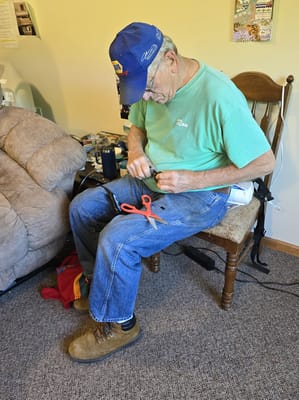 Senior resident engaged in a crafting activity