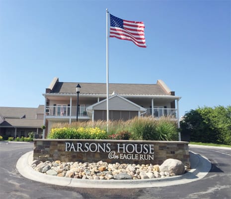 Exterior view of Parsons House with flag