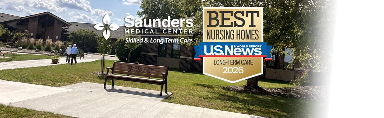 Outdoor view of Saunders Medical Center with logo