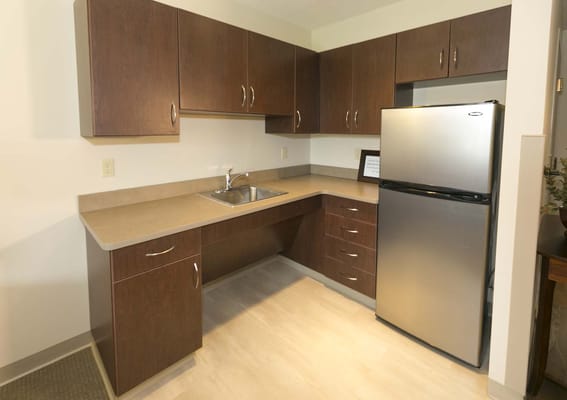 Interior kitchen space in a senior living unit