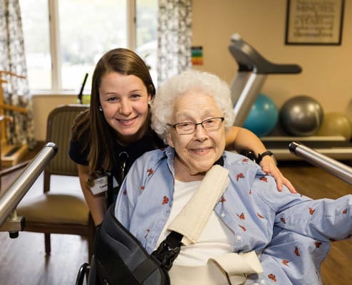 Staff member with resident in an activity area