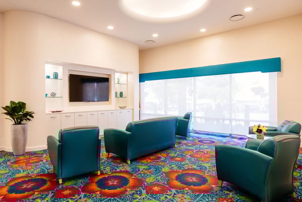 Colorful lounge area with modern seating and decor