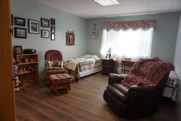 Cozy resident room with personal touches and natural light