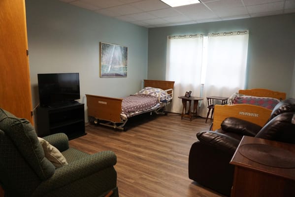 Private resident room with furniture and natural light