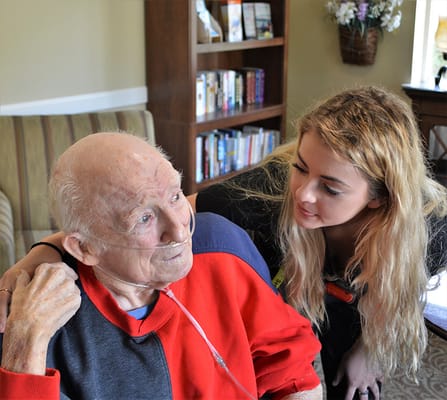 A staff member interacting with a resident