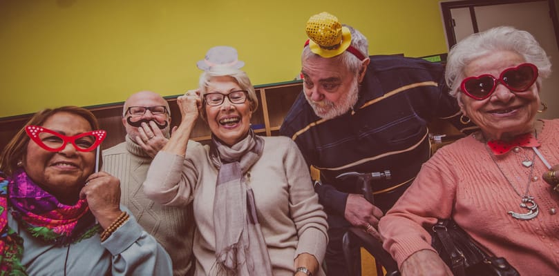 Residents enjoying a fun activity with playful accessories