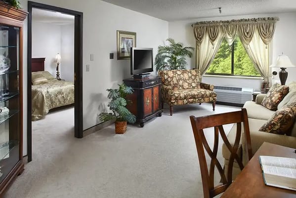 Cozy resident room with a living area and bedroom