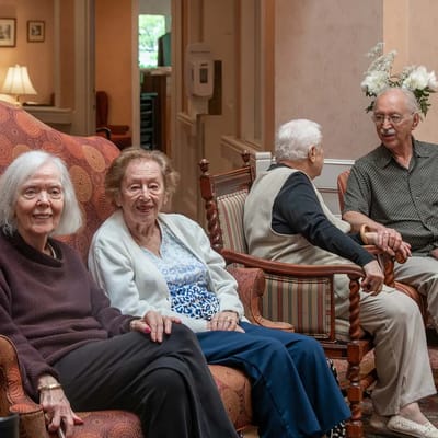 Residents enjoying conversation in a common area
