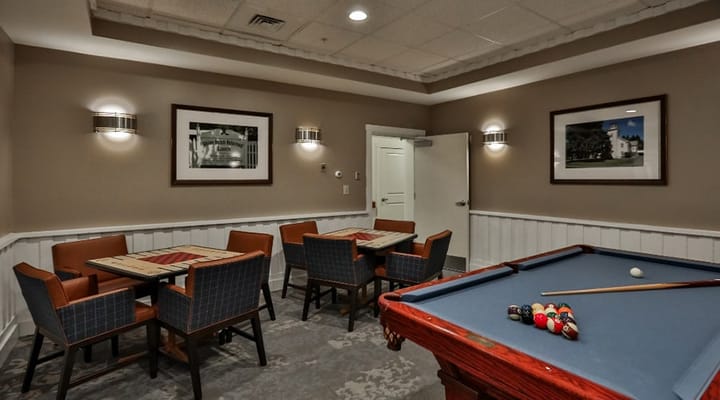 Interior common area with pool table and seating