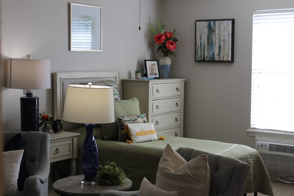 A cozy resident room with decorative elements