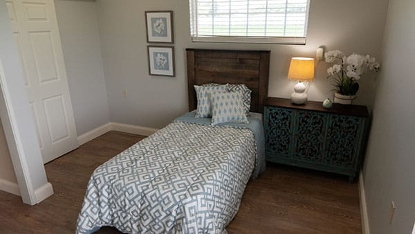 A cozy bedroom setup in the facility