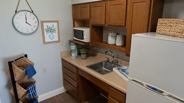 Well-equipped kitchenette in an assisted living unit